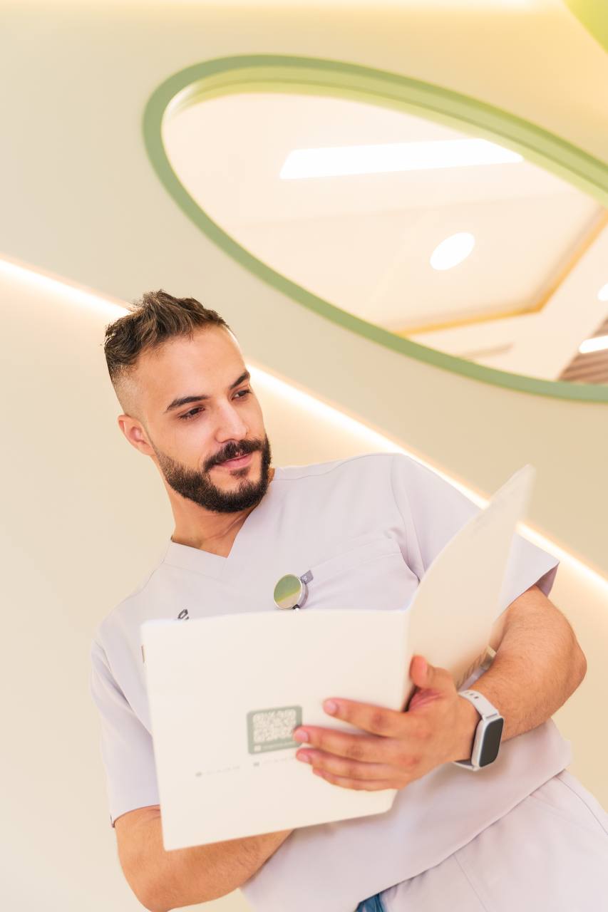 A Longevium doctor reviewing test results and documents