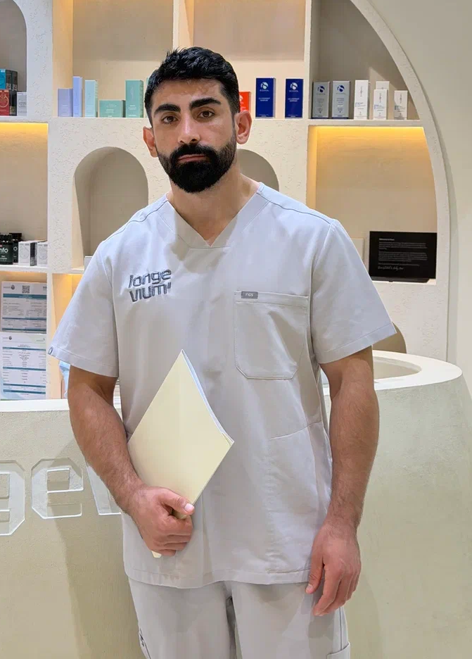 Dr Nurmagomed standing in the Longevium clinic
