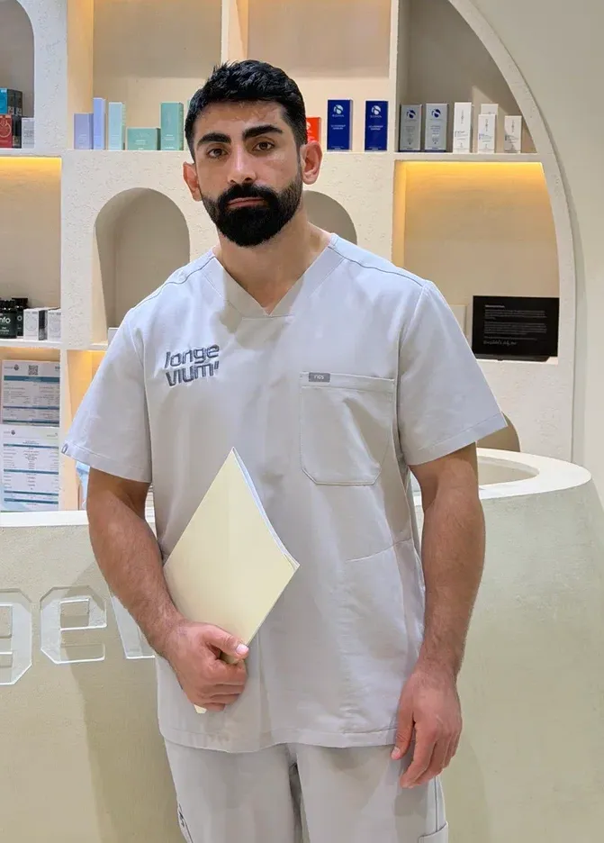 Dr Nurmagomed standing in the Longevium clinic